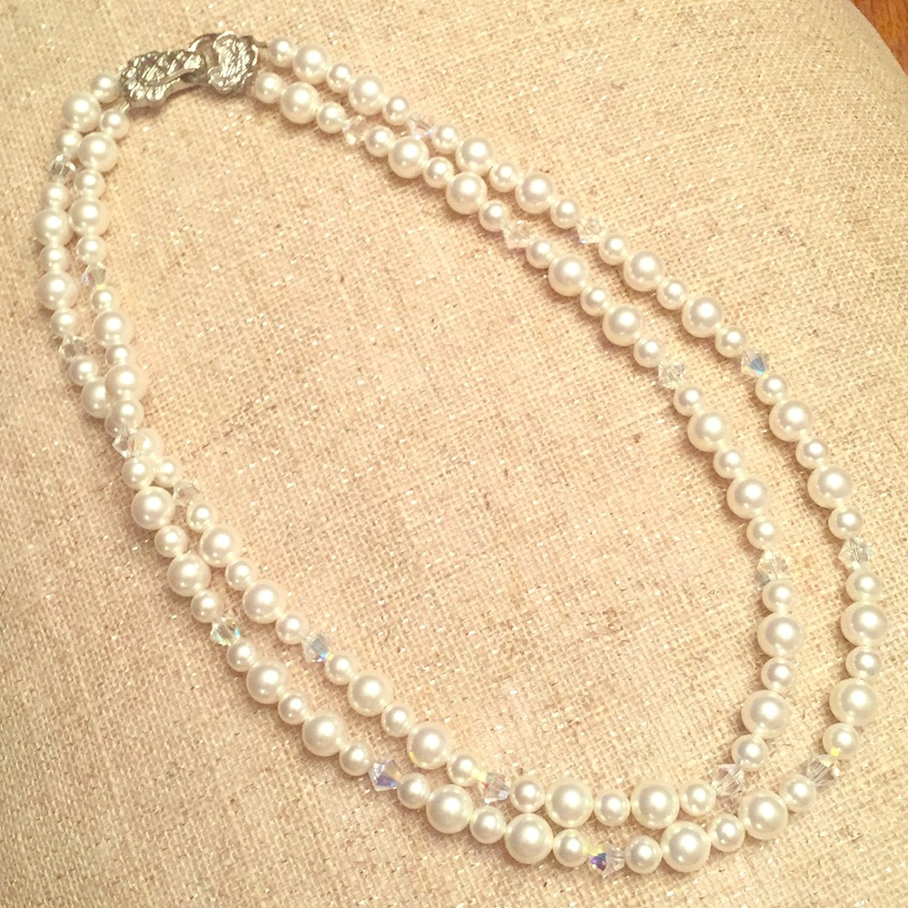 Double strand pearl and crystal necklace.